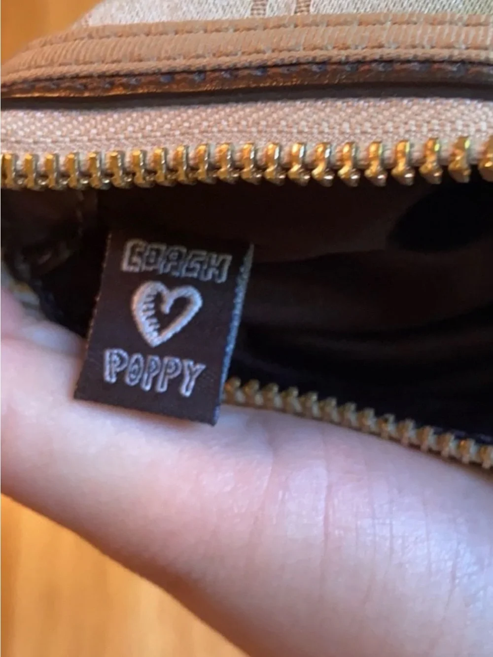 Coach Beige Signature Wristlet Pouch with Gold Logo Plaque